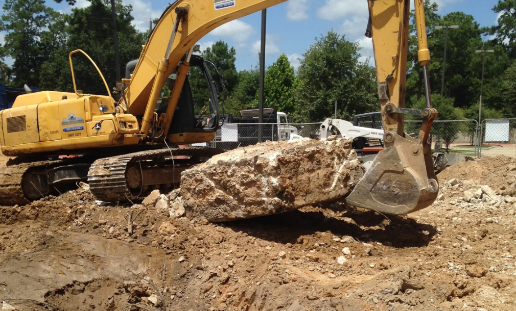 Slab removal and concrete breaking — construction site preparation (14)